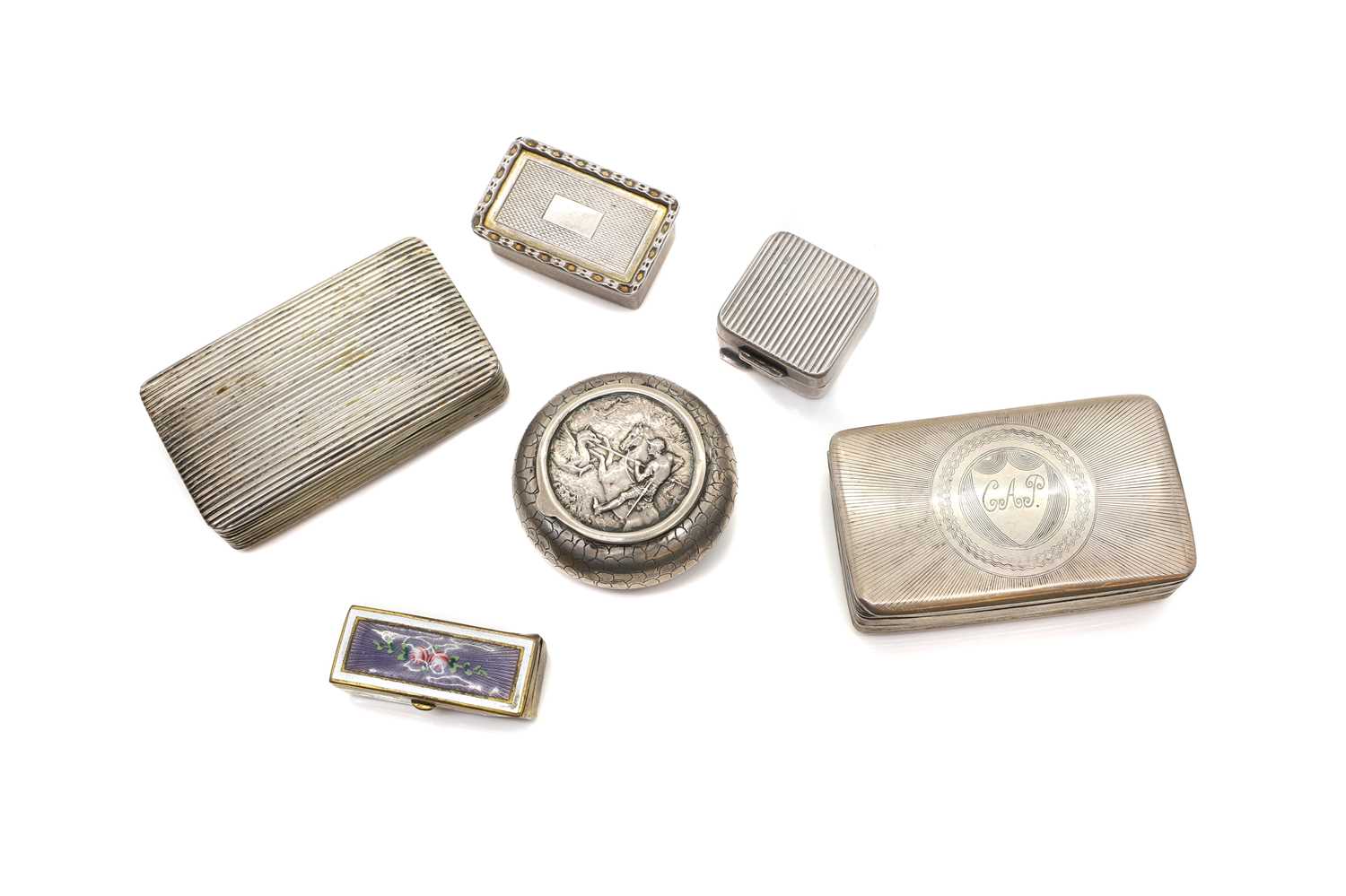 Lot 18 - A group of five silver pill and snuff boxes,