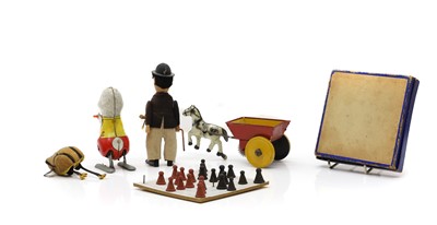 Lot 518 - A collection of tin plate toys