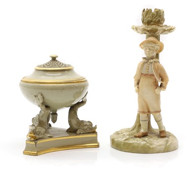 Lot 158 - A Royal Worcester porcelain figural candlestick