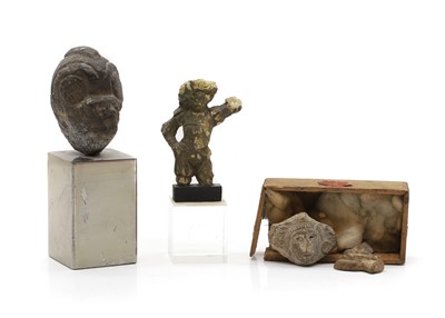 Lot 228 - A group of schist stone carvings