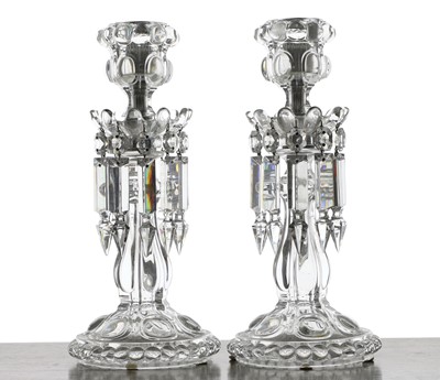 Lot 186 - A pair of Baccarat glass candlesticks