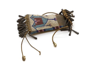 Lot 487 - A North American Plains beaded strike-a-light bag