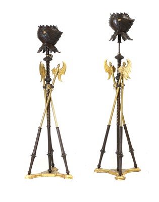 Lot 626 - A pair of Continental bronze torcheres