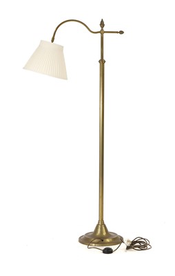 Lot 625 - A brass reading lamp