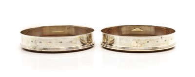 Lot 60 - A pair of modern silver Champagne coasters