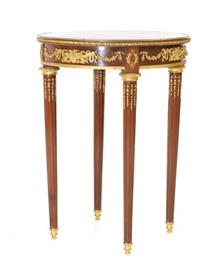 Lot 767 - A Louis XVI style ormolu and parquetry Gueridon