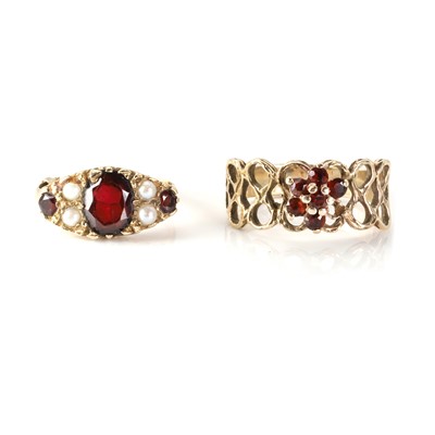 Lot 1317 - Two garnet set rings