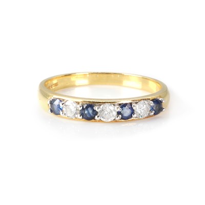 Lot 1147 - An 18ct gold sapphire and diamond ring