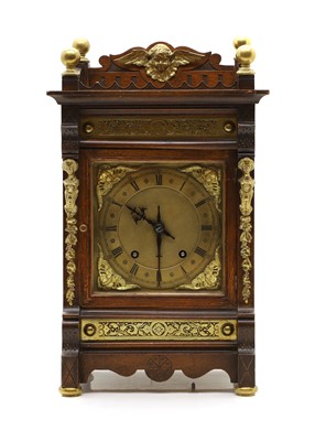 Lot 397 - A eight day mantel oak and gilt-brass clock by Winterhalder-Hofmeier