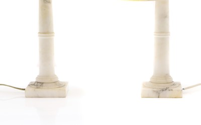 Lot 615 - A pair of alabaster columnar table lamps