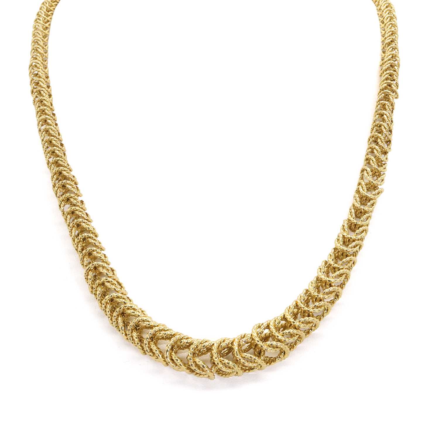 Lot 1084 - An 18ct gold graduated fancy link chain necklace, c.1960