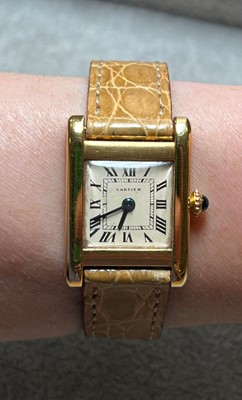 Lot 355 - A ladies' 18ct gold Cartier Tank Louis mechanical strap watch