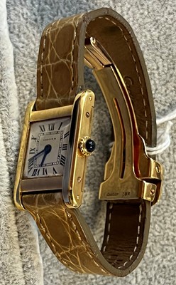 Lot 355 - A ladies' 18ct gold Cartier Tank Louis mechanical strap watch