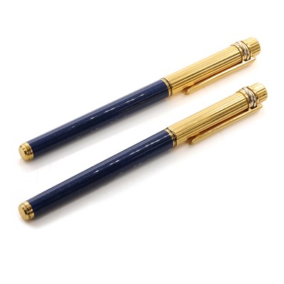 Lot 1516 - A Must de Cartier fountain pen and a Must de Cartier ballpoint pen