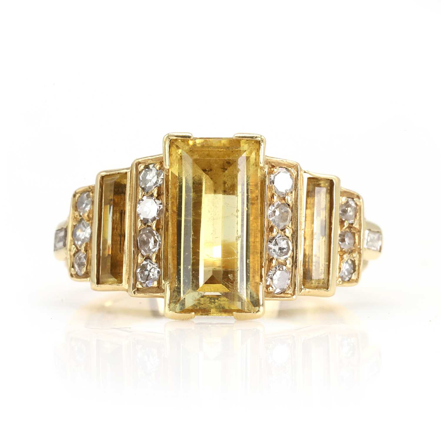Lot 158 - A yellow beryl and diamond ring