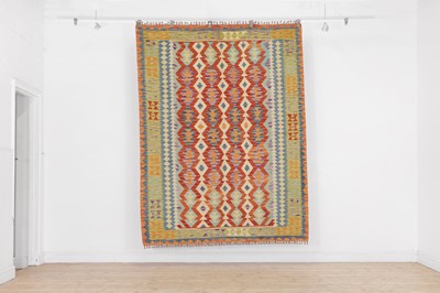 Lot 104 - A kilim flat-weave wool rug