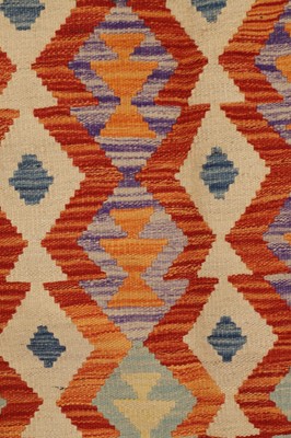 Lot 104 - A kilim flat-weave wool rug