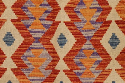 Lot 104 - A kilim flat-weave wool rug