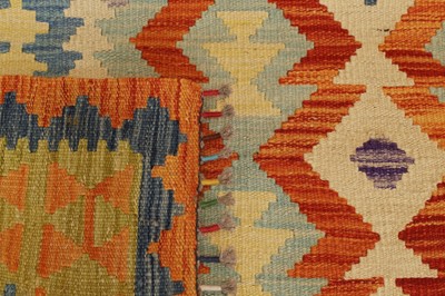 Lot 104 - A kilim flat-weave wool rug