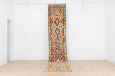 Lot 570 - A kilim flat-weave wool runner