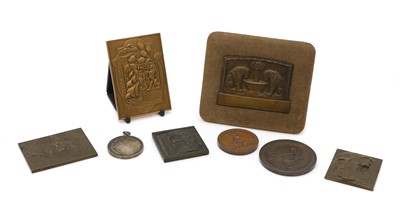 Lot 450 - Five cast and patinated bronze plaques