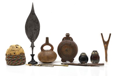 Lot 496 - Two Argentinian mounted mate gourds and bombillas