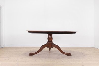 Lot 143 - A George III-style oak tripod dining table