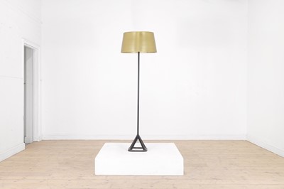 Lot 102 - A modernist cast iron and brass floor lamp by Tom Dixon