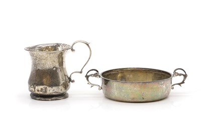 Lot 7 - A silver twin handled tastevin