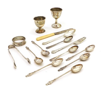 Lot 63 - A collection of silver cased flatware