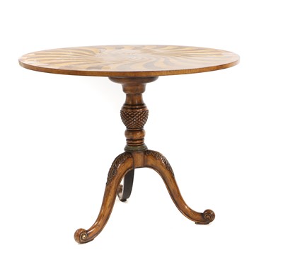 Lot 696 - A walnut tripod table