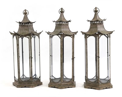 Lot 616 - A set of three aged metal lanterns