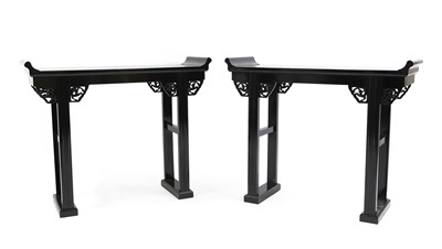 Lot 694 - A pair of Chinese ebonised alter tables