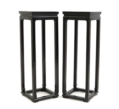 Lot 640 - A pair of black lacquer stands