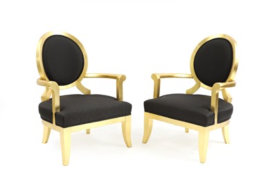 Lot 645 - A pair of Andrew Martin open armchairs