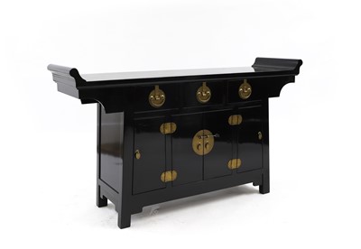 Lot 671 - A Chinese ebonised side cabinet