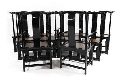 Lot 698 - A set of eleven Chinese ebonised dining chairs