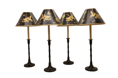 Lot 650 - A set of four table lamps