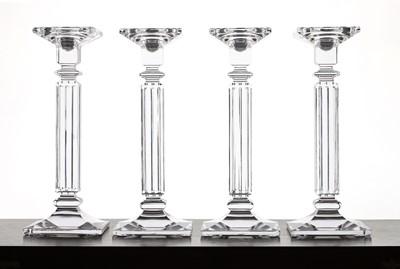 Lot 291 - A set of four contemporary glass candlesticks