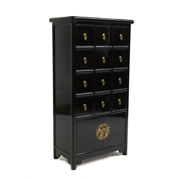 Lot 642 - A Japanese black lacquered cabinet