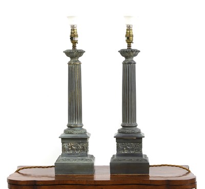 Lot 660 - A pair of blue painted table lamps