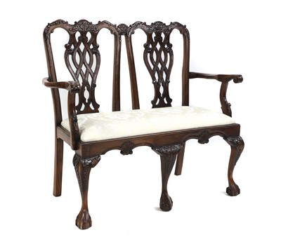 Lot 663 - A mahogany two seater settee