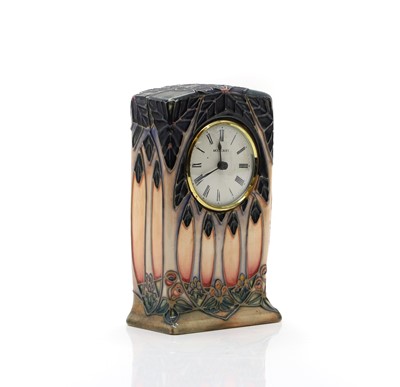 Lot 259 - A Moorcroft pottery 'New Forest' pattern clock