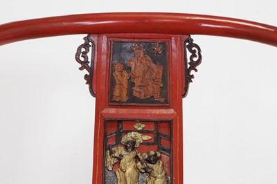 Lot 636 - A pair of red lacquer horseshoe-back chairs
