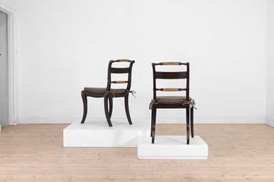 Lot 641 - A pair of Regency simulated rosewood and parcel-gilt side chairs