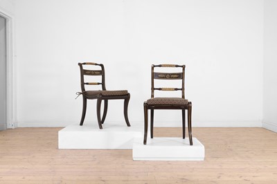 Lot 641 - A pair of Regency simulated rosewood and parcel-gilt side chairs