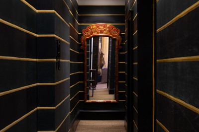 Lot 635 - A George I-style red and gilt japanned pier mirror