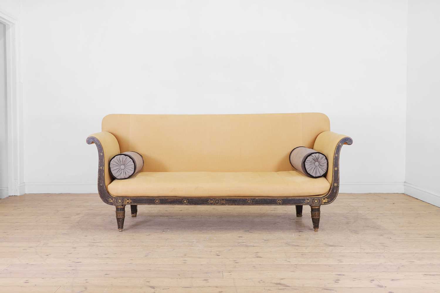 Lot 634 - A Regency simulated rosewood sofa