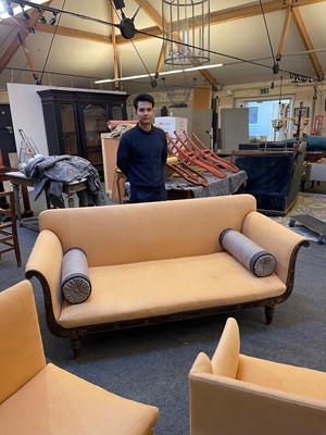 Lot 634 - A Regency simulated rosewood sofa