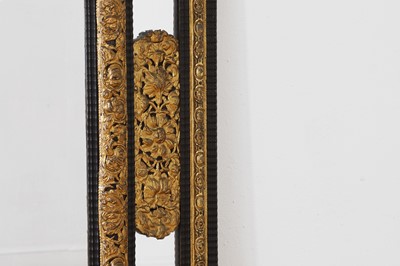Lot 631 - A baroque gilt-metal and ebonised wooden pier mirror